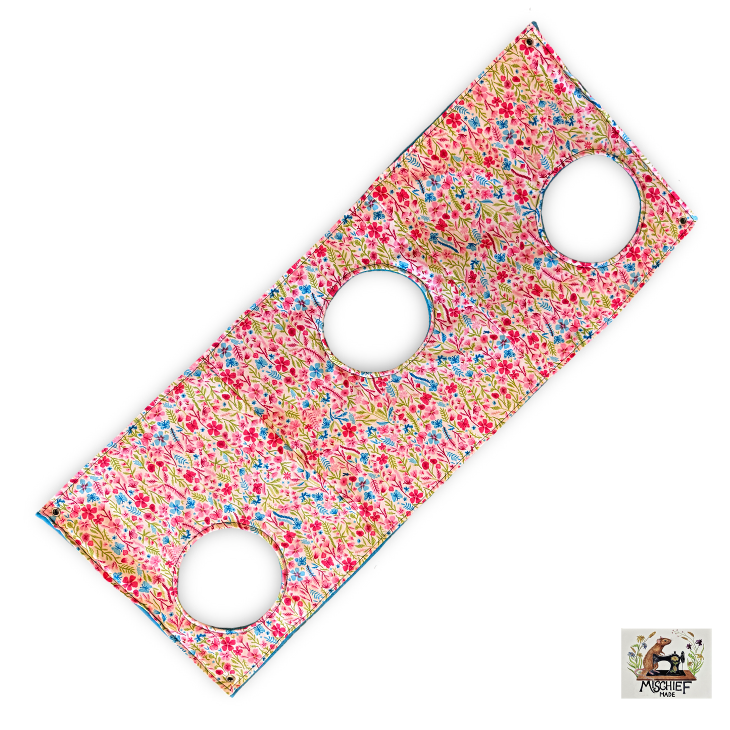 Swiss fall-breaker hammock. Pink ditsy print with Turquoise fleece. Padded and quilted.