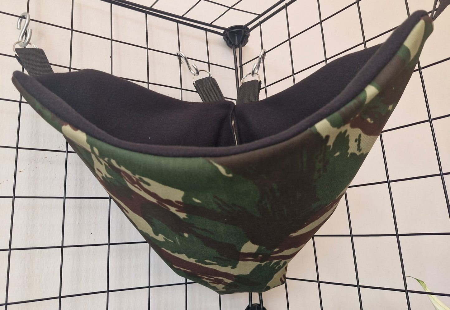 Mischief Made fleece lined corner pocket. Camo print with black fleece lining