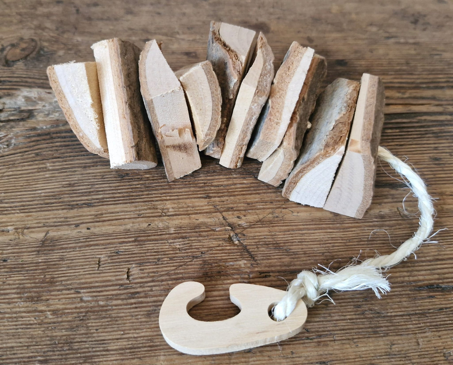 Hanging wooden chew toy