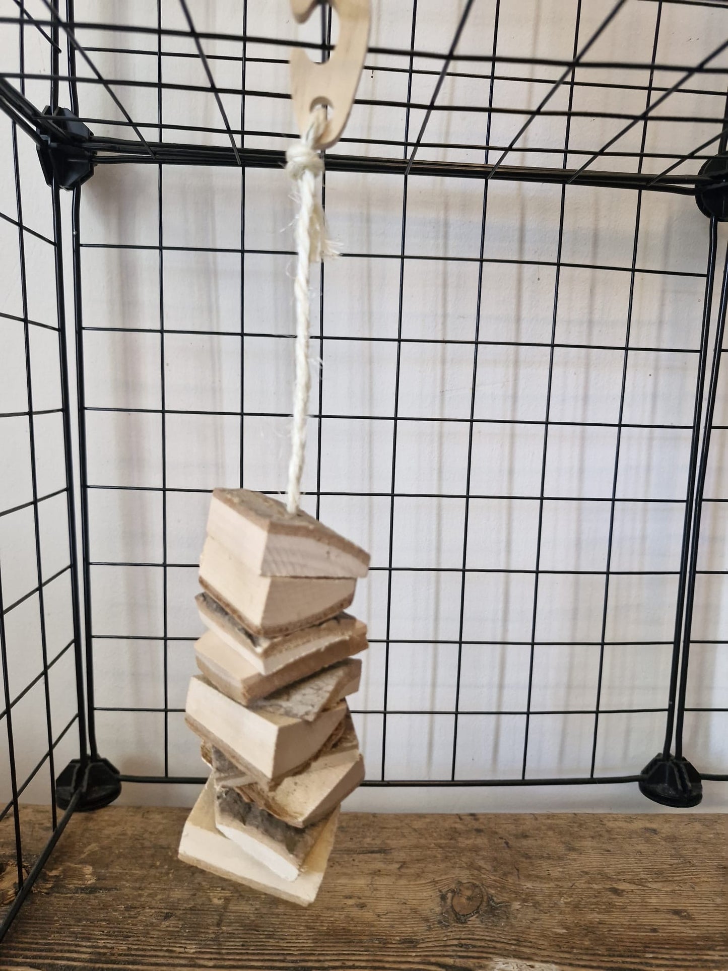 Hanging wooden chew toy