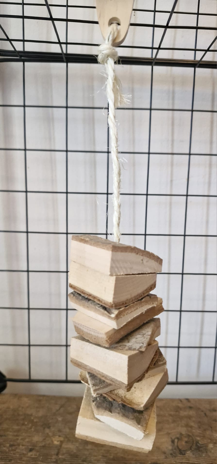 Hanging wooden chew toy
