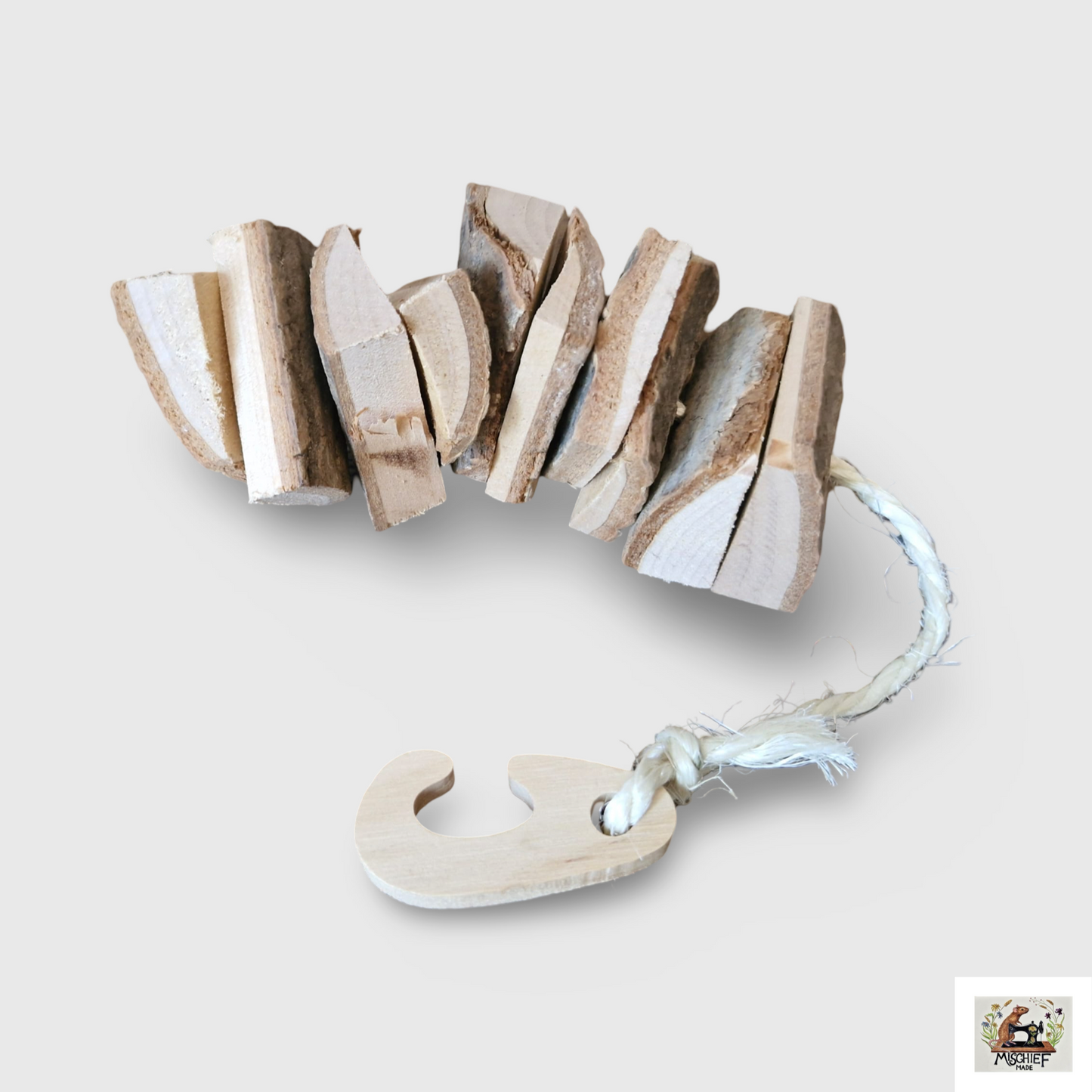 Hanging wooden chew toy