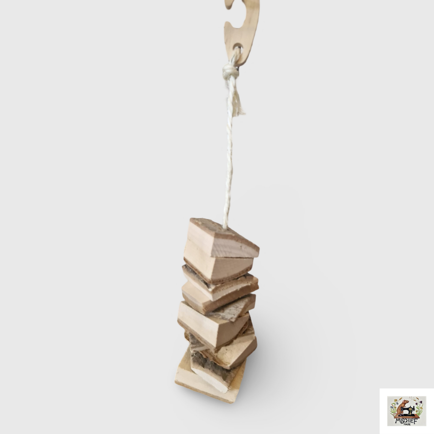 Hanging wooden chew toy