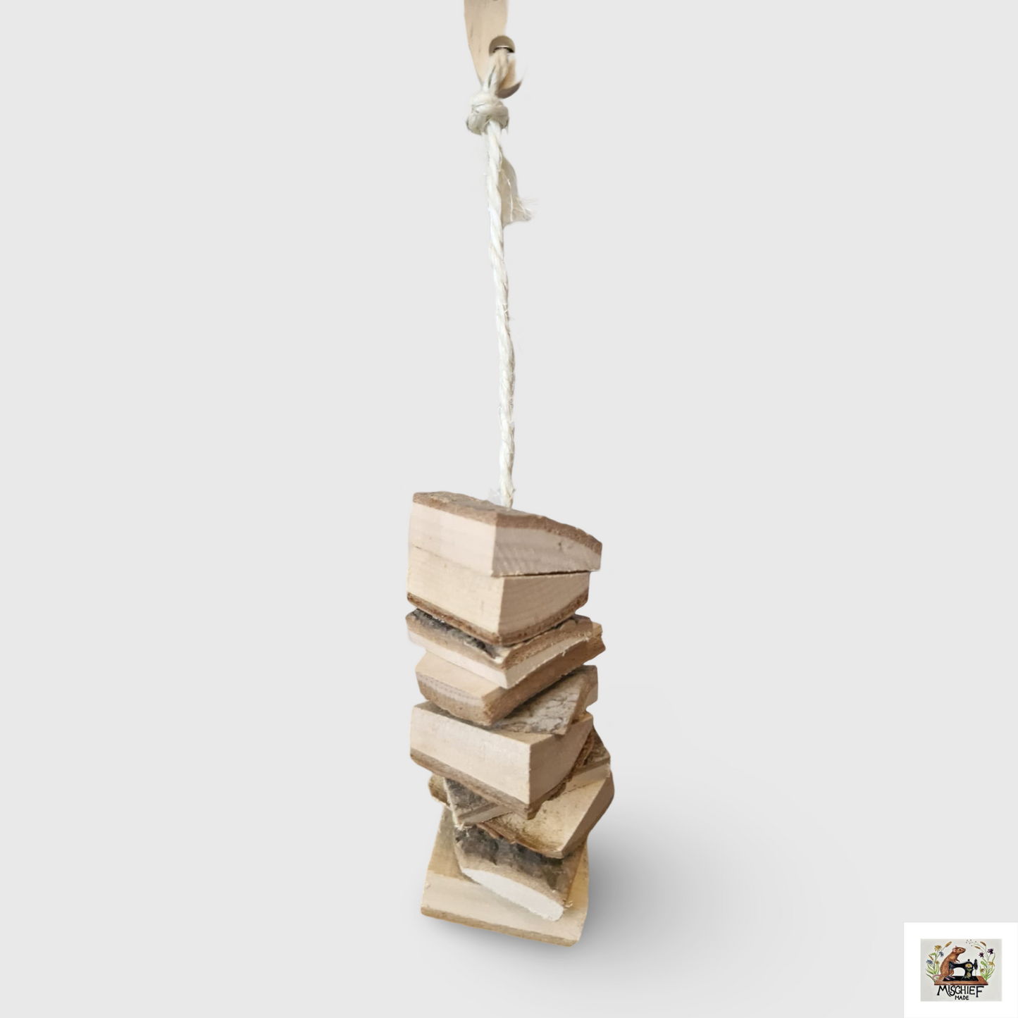Hanging wooden chew toy